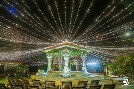 Traditional Indian wedding decor in Hyderabad With Beautiful Wedding Mandap,Pathway by showkase house.Its decor done with Eco Friendly theme